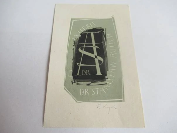 Exlibris – Dr. Stanisław Aulich – Ryszard Krzywka – motiv: Abstraktní knižní kompozice s monogramem SA – 11×7 cm – dvoubarevný dřevoryt (X2/2)