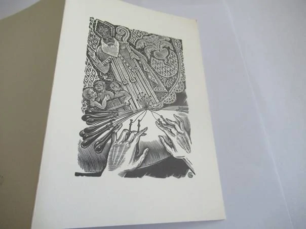 Původní sběratelská novoročenka Kantklossen 1984 – autor Gerard Gaudaen (Belgie), motiv krajkářek a sv. Mikuláše, původní dřevoryt X2 (17,5 × 11,5 cm)