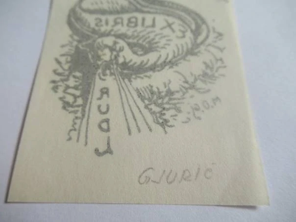 Exlibris V. Rudl, Milenko D. Gjurić, 1921 – originální dřevoryt, motiv hada s nápisovou páskou, podkladový papír 7,5x5,5 cm
