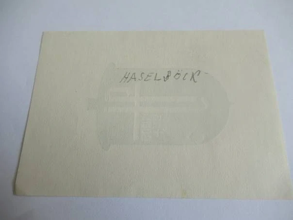 Exlibris – Fritz Born – Karl Haselböck – motiv: Typografický a heraldický motiv ve tvaru zvonu s iniciálami a fontánou – rozměry 12,5×8,5 cm – dřevoryt (X2) – 2. polovina 20. století