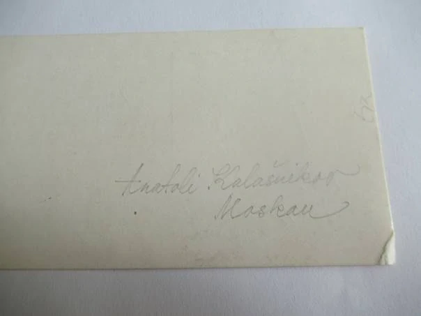 Sběratelská PF 1967 – autor: Anatolij Kalašnikov – motiv 50 let Říjnové revoluce, Mezinárodní výstava knih v Moskvě (16 × 6,5 cm)