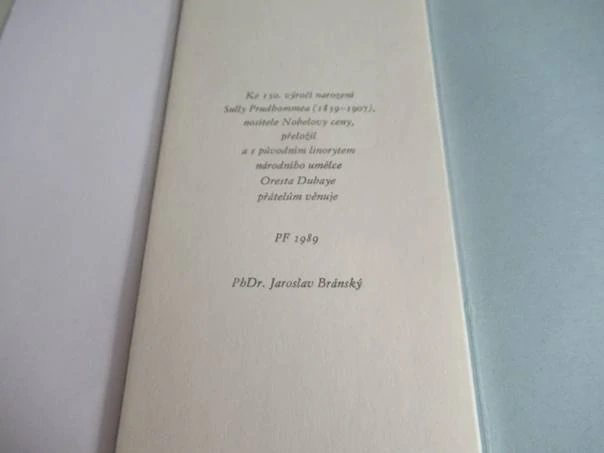 Grafický list s básní „Tam u nábřeží“ (Sully-Prudhomme), vhodné pro sběratele exlibris a slovenské moderní grafiky, autor národní umělec Orest Dubay st., originální podepsaný linoryt (číslovaný výtisk 111/200), rozměr složeného listu 21 × 10 cm