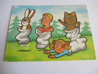 J. Němeček: zvířátka a děti v pytlích
